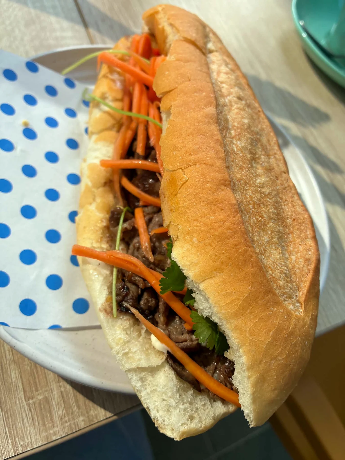 Beef bánh mì with crisp pickled carrot and coriander