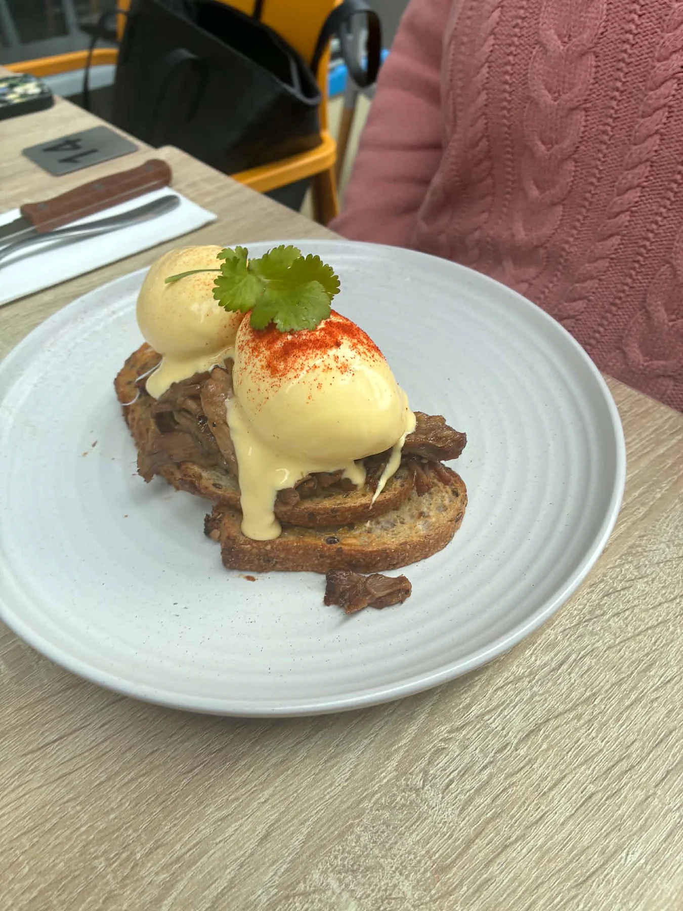 Pulled pork Benedict with poached eggs and hollandaise